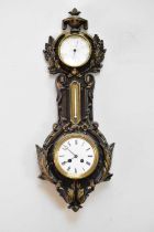 An early 20th century bronzed metal combination clock barometer/thermometer, the barometer signed 'J