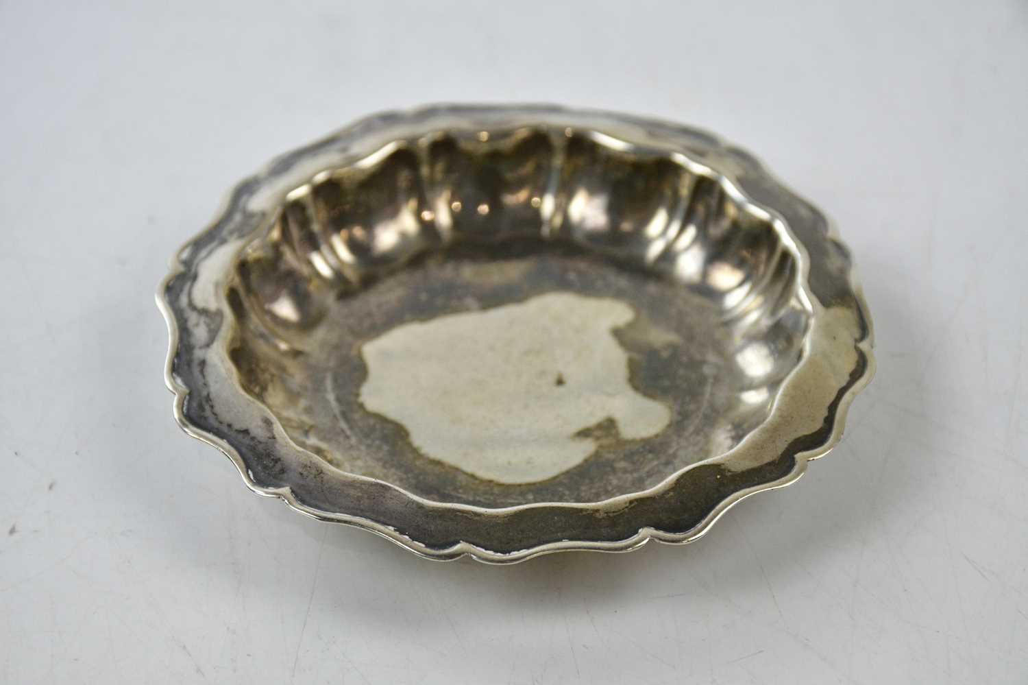 ISRAEL FREEMAN & SONS LTD; a George VI hallmarked silver pin dish, London 1945, together with a - Image 2 of 5
