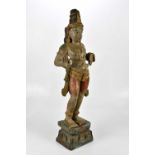 A 20th century painted carved wooden Hindu sculpture of celestial dancer, on plinth base, height