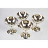 Four Syrian white metal goblets, height 9.5cm, approx weight 24.24ozt/735g.