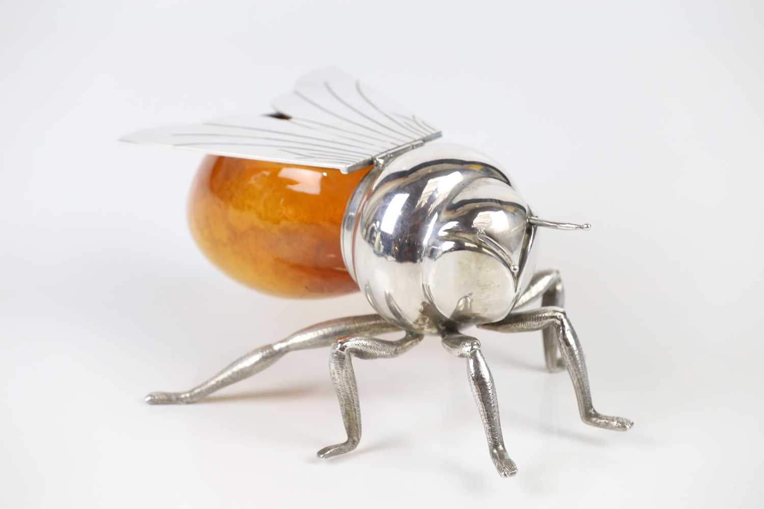 MAPPIN & WEBB; a silver plated bee honey pot with amber glass body, height 8.5cm.