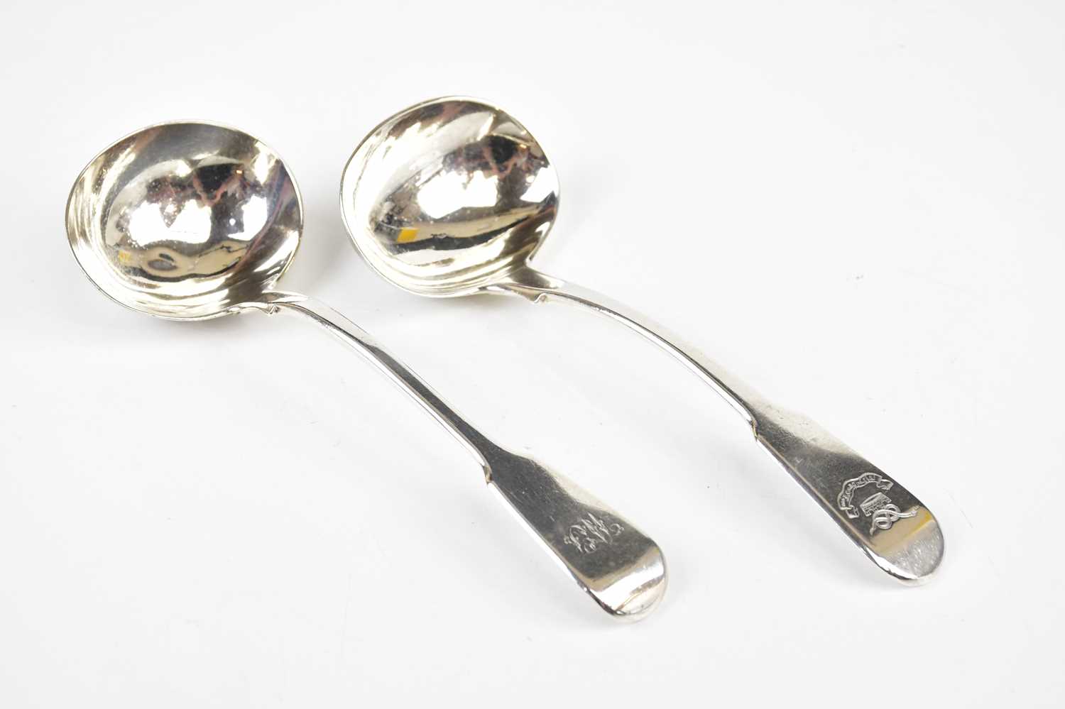 CHAWNER & CO; a Victorian hallmarked silver sauce ladle, London 1844, and a similar hallmarked