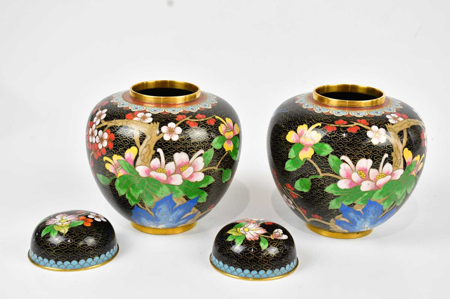 A pair of 20th century Chinese cloisonné ginger jars and covers, with prunus decoration, on wooden - Image 4 of 8