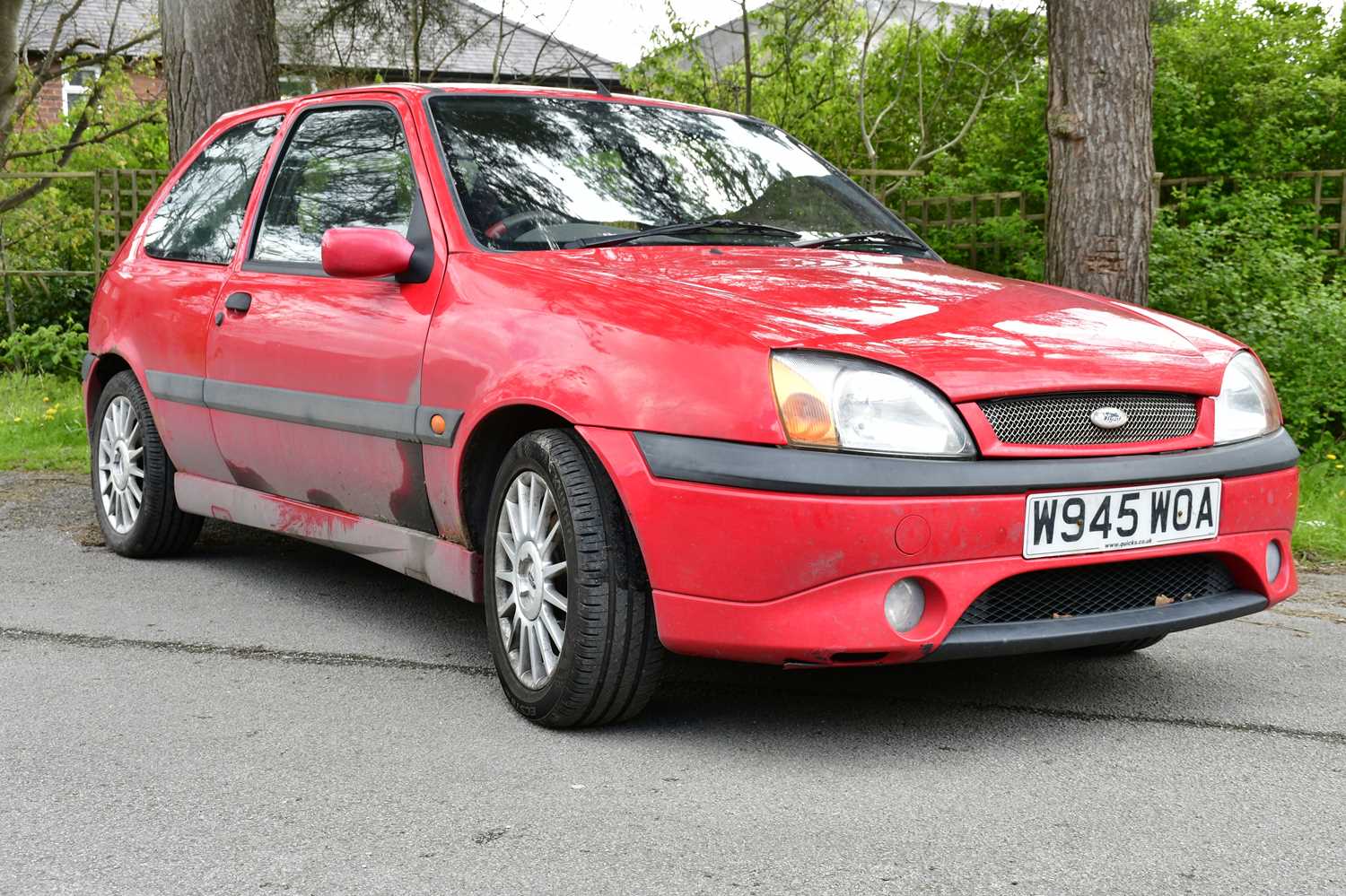 A Ford Fiesta, red, W945 WOA, complete with one key, with V5, service history and log book and MOT