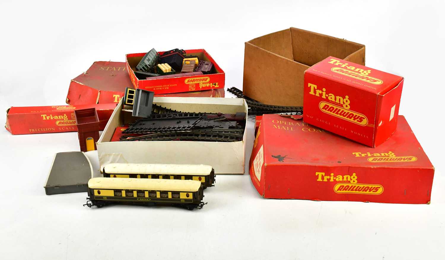 TRI-ANG RAILWAY; a collection of rolling stock, accessories, carriages and assorted track.