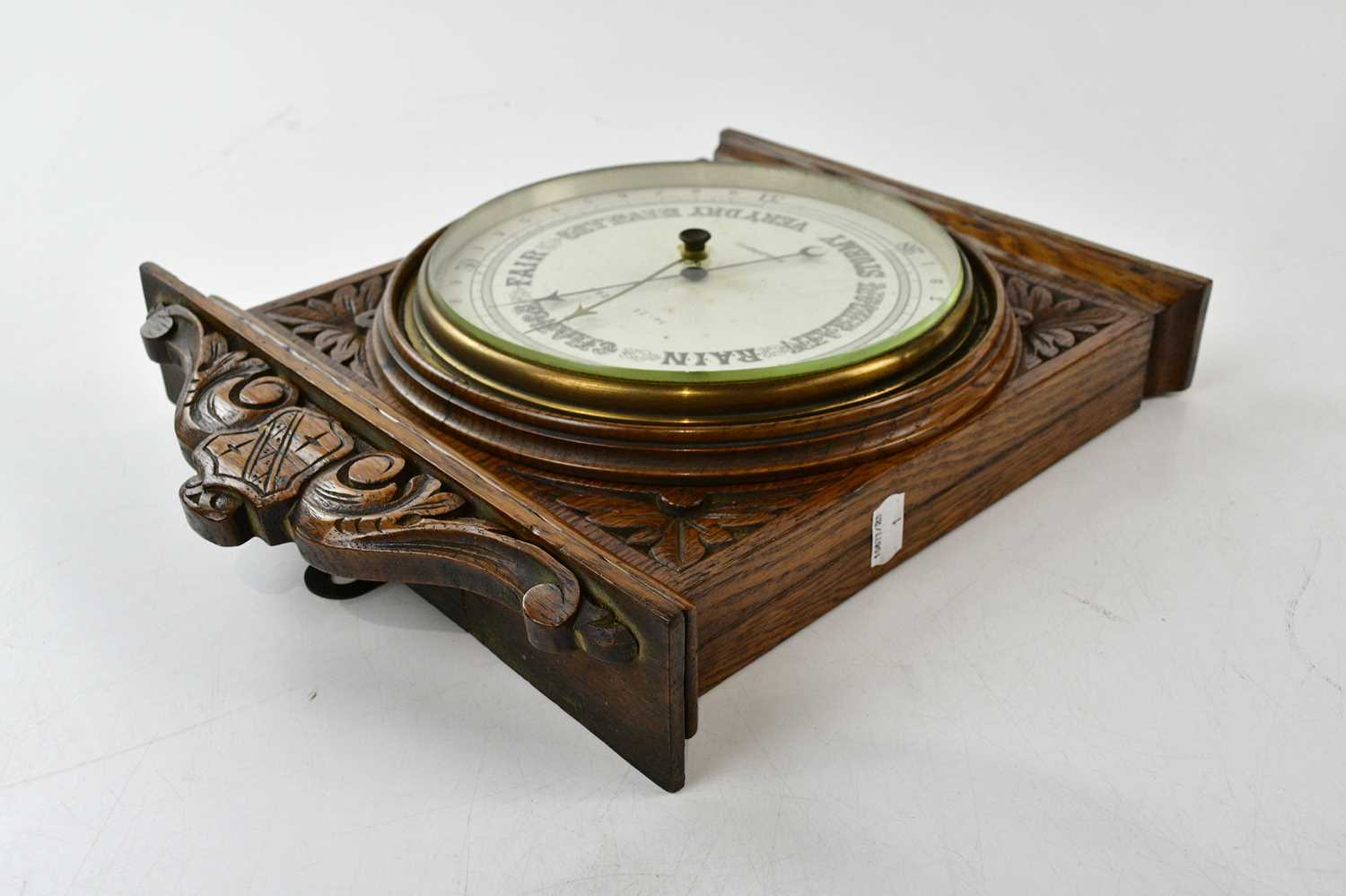 An early 20th century carved oak aneroid barometer, dial signed 'Bradford', 37 x 30cm. - Image 3 of 3