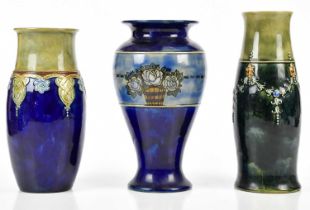 ROYAL DOULTON; three Artware vases including an example relief decorated with mask heads and