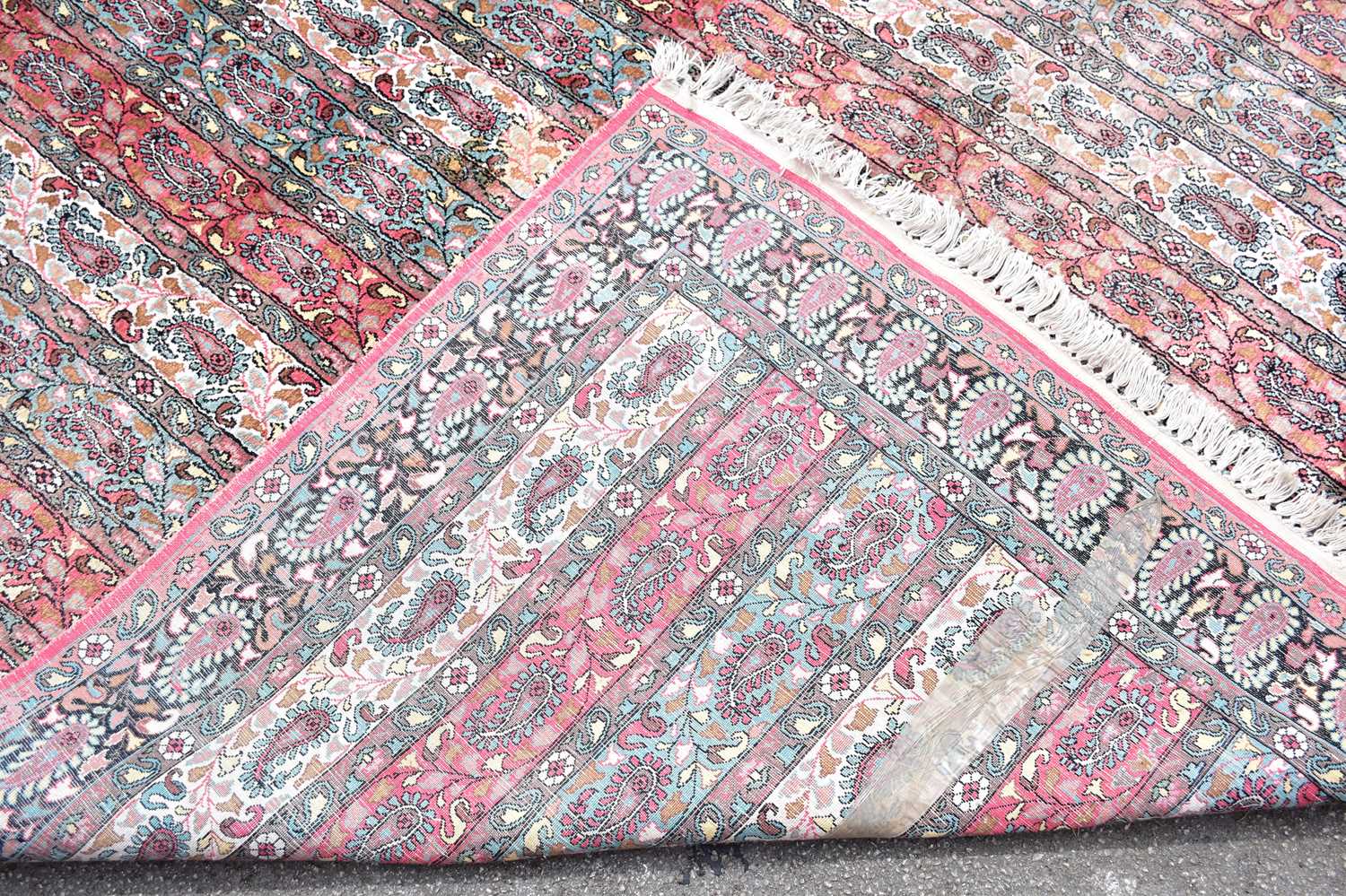 A large pink ground Eastern style carpet with paisley pattern design, 260 x 390cm. - Image 3 of 3