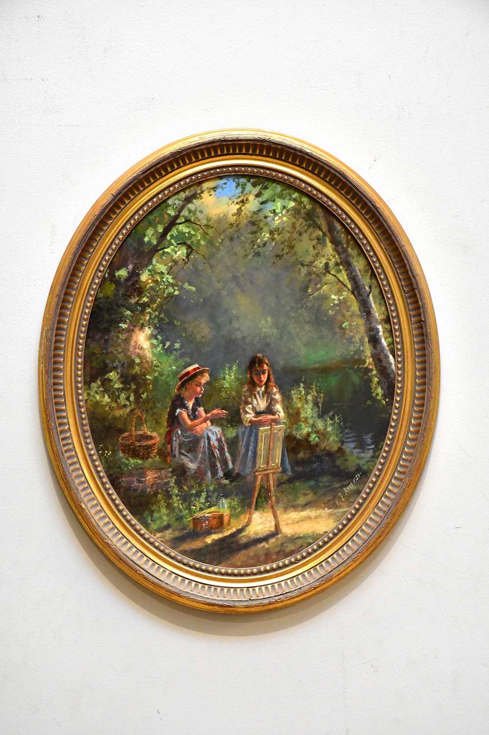 † PAUL ATTFIELD (born 1950) oval oil on board, girls painting landscape, signed, 49 x 39cm, framed.