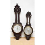 ELSTANCE & CO; a late Victorian carved walnut barometer with thermometer, length 88cm, with an oak