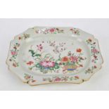 A circa 1800 Chinese Famille Rose Export ware meat plate, decorated with still life scenes of