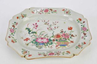 A circa 1800 Chinese Famille Rose Export ware meat plate, decorated with still life scenes of