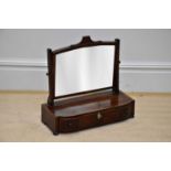 A William IV inlaid mahogany toilet mirror, with three drawer base, height 52cm, width 54cm.