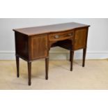 An Edwardian inlaid mahogany Sheraton Revival sideboard, with single drawer flanked by two
