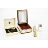A contemporary sterling silver mounted jewellery casket, a glass top dressing table bottles with