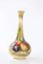 WILLIAM RICKETT FOR ROYAL WORCESTER; a hand painted bud vase decorated with fruits, height 13cm.