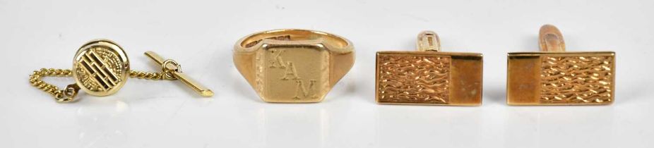 A 9ct yellow gold gentleman's signet ring with engraved initials 'KAM', size R, a pair of 9ct yellow