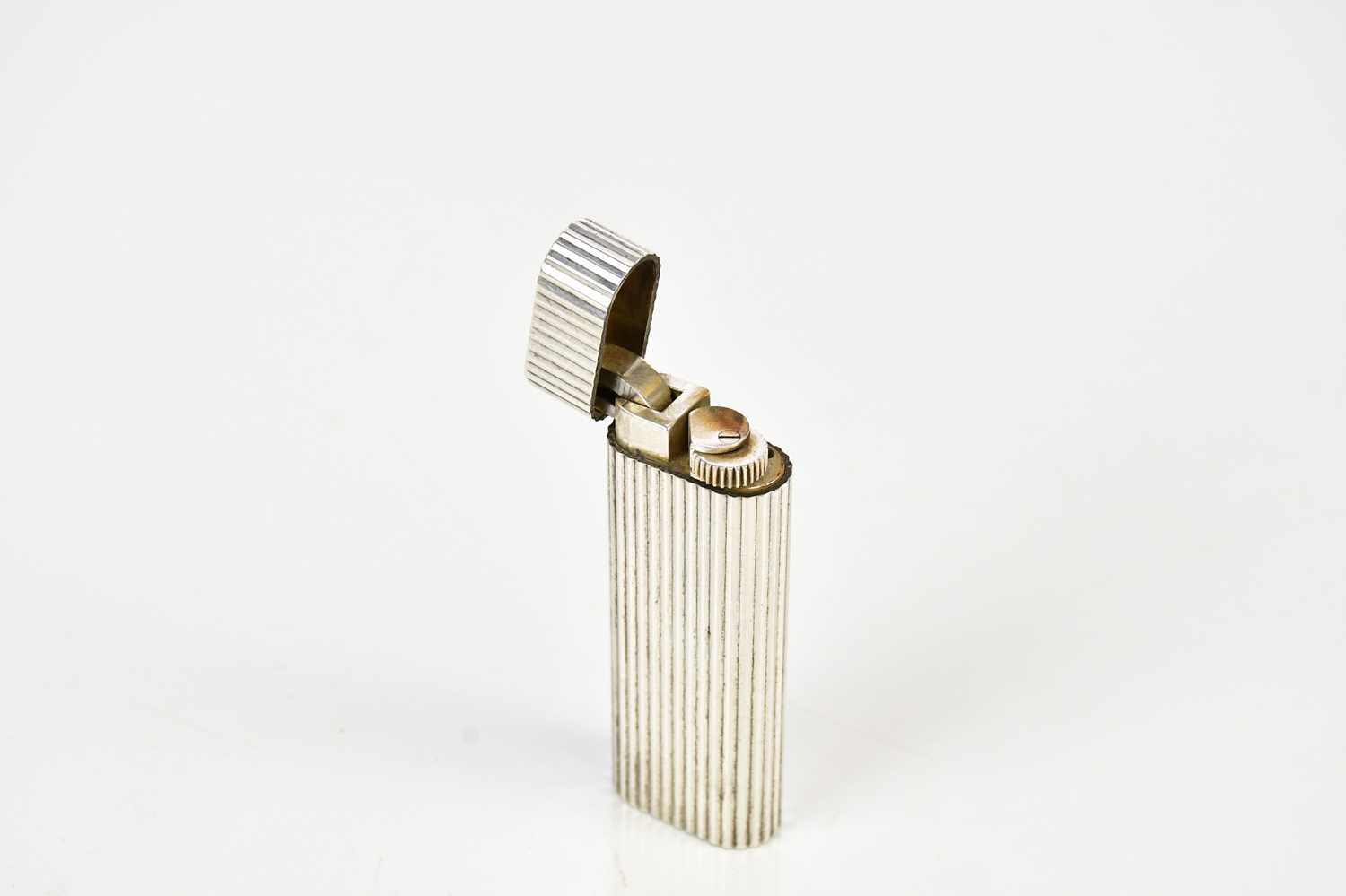 CARTIER; a silver plated cigarette lighter, reference number 107569. - Image 2 of 3