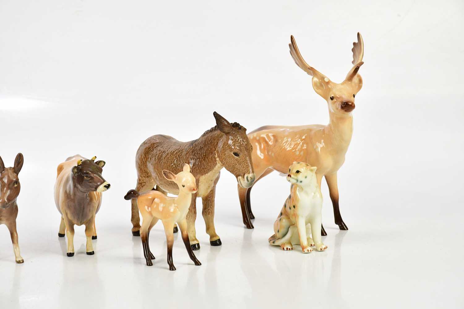 BESWICK; a collection of figures to include cow, donkey, lion, deer, etc. - Image 3 of 3