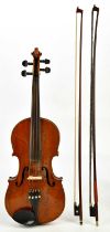 A full size German violin with two-piece back length 35.8cm, unlabelled, cased with two bows.