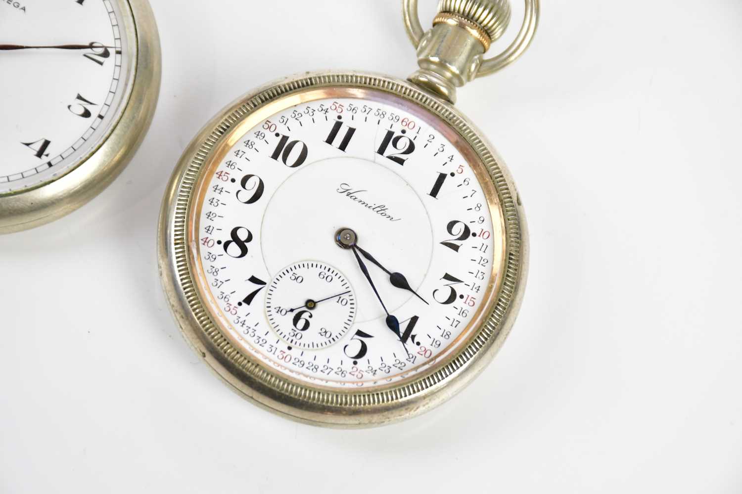 OMEGA; a crown wind base metal cased open faced pocket watch, set with Arabic numerals and - Image 3 of 3