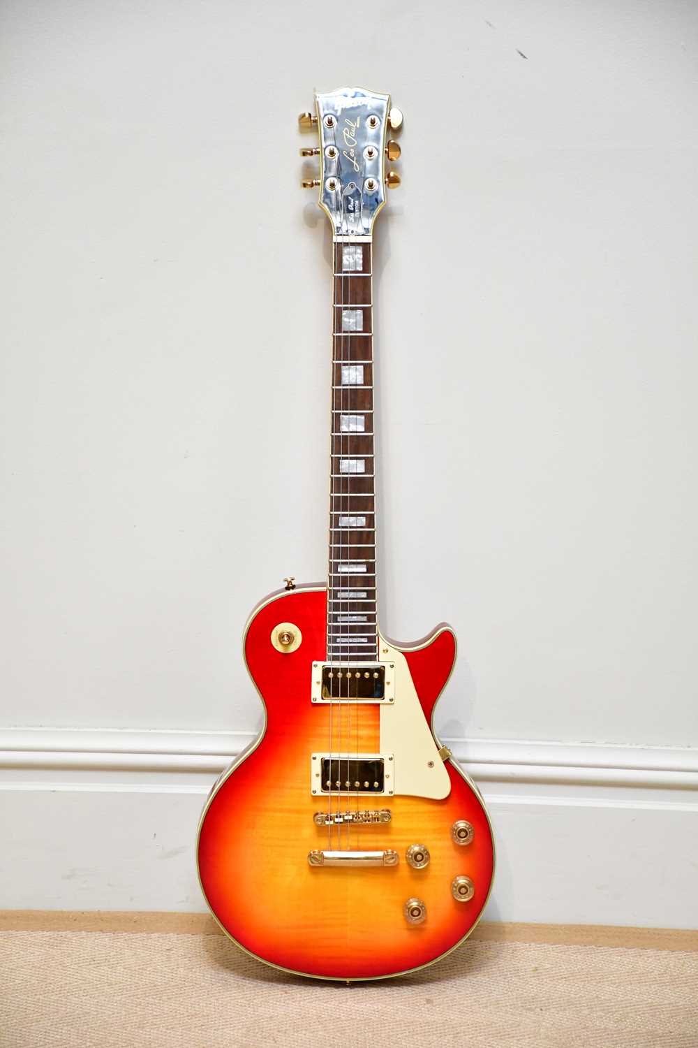 A Gibson style Les Paul custom electric guitar, serial number 01433746, together with Gibson case