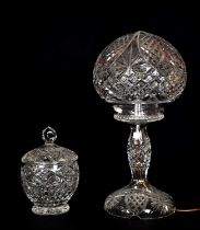 A cut glass lamp and shade, together with a cut glass jar and cover, height 40cm. Condition