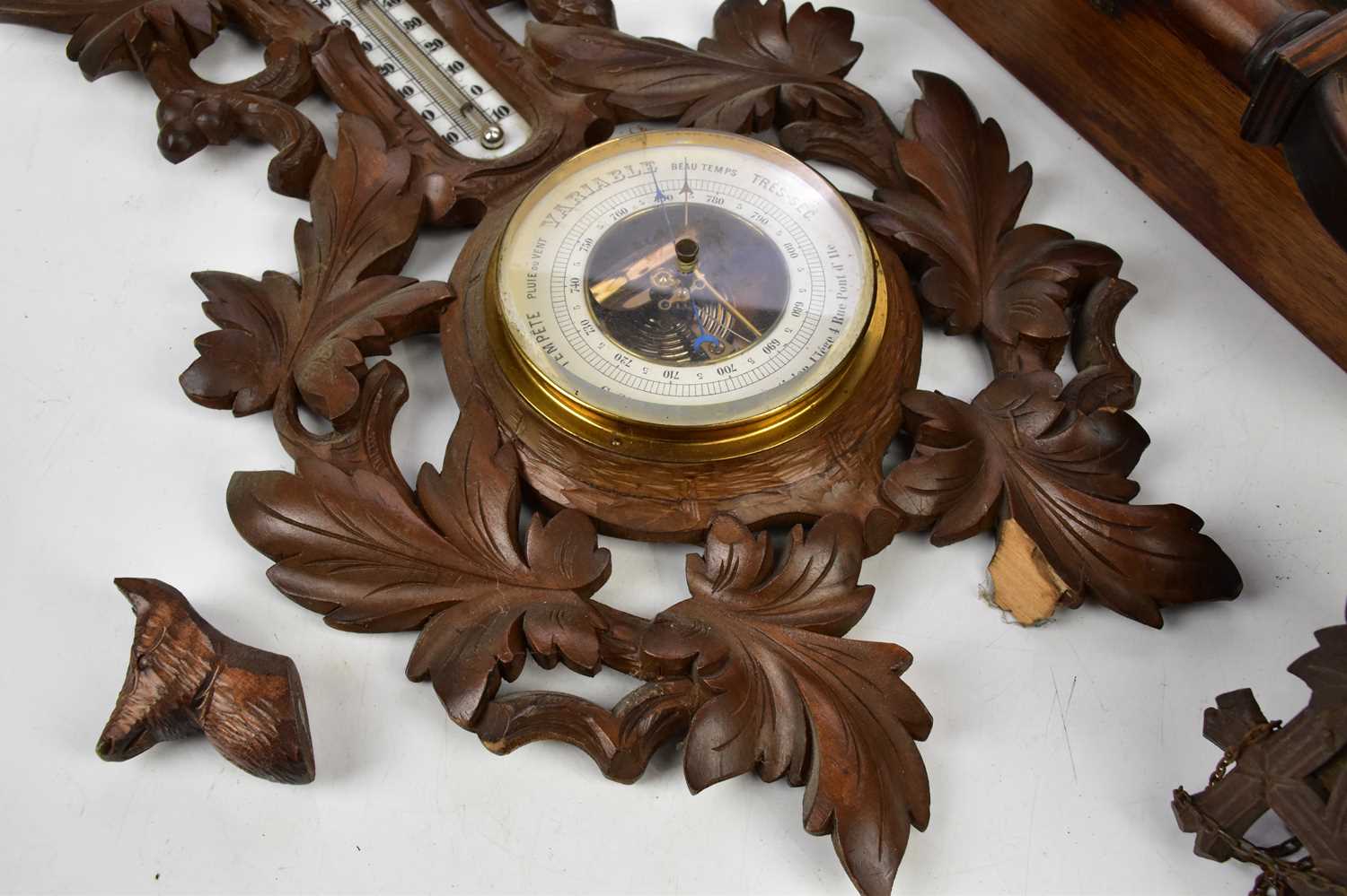 A Black Forest carved wood combination barometer and therometer, length 55cm, with two cuckoo clocks - Image 4 of 4