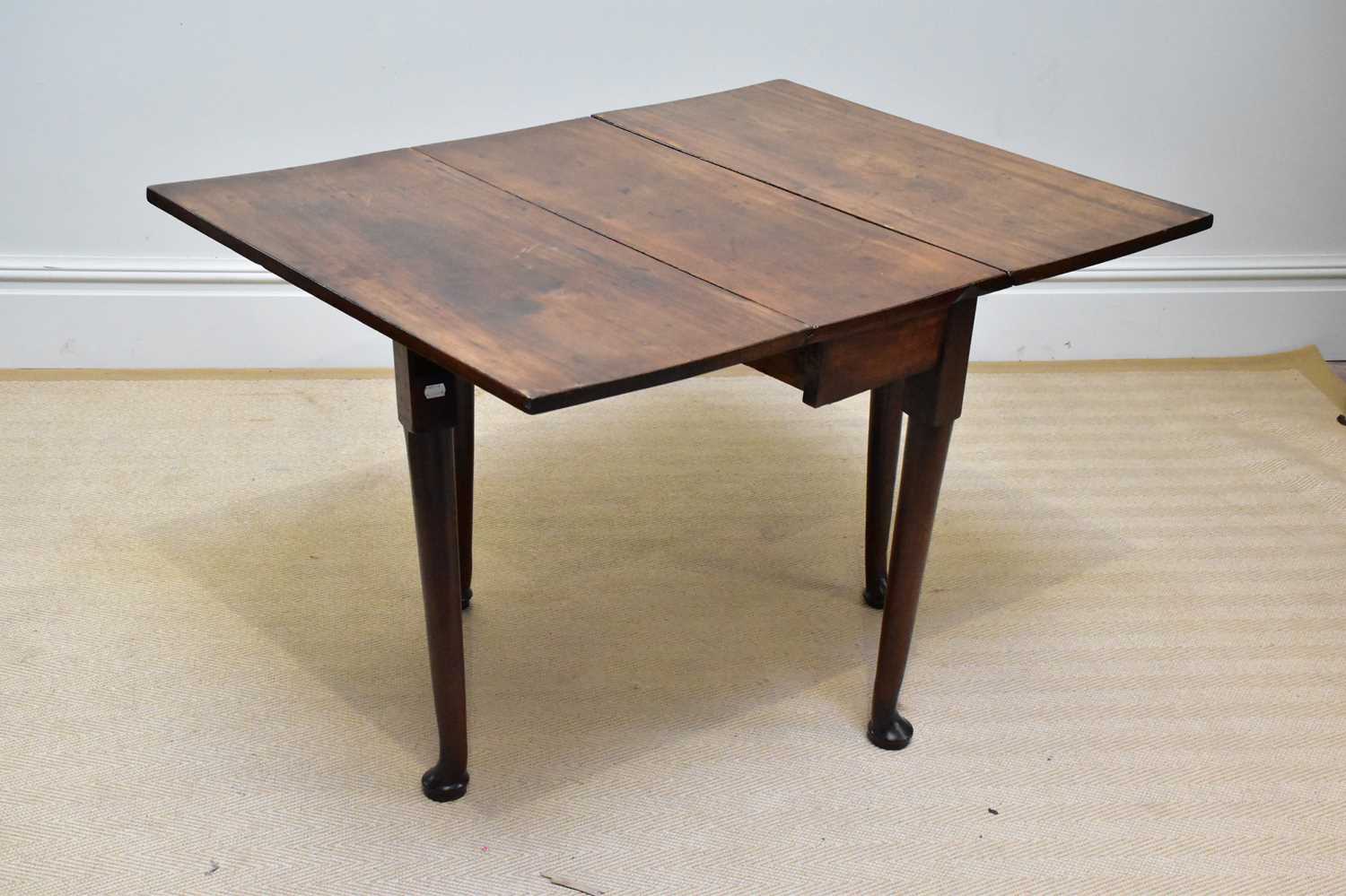 A 19th century mahogany drop-leaf table, on tapered legs and pad feet, height 72cm, width 83cm. - Image 2 of 2