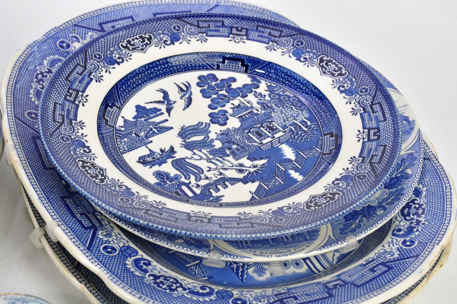 A collection of blue and white ceramics including an Ironstone 'Willow' pattern meat plate. - Image 2 of 4