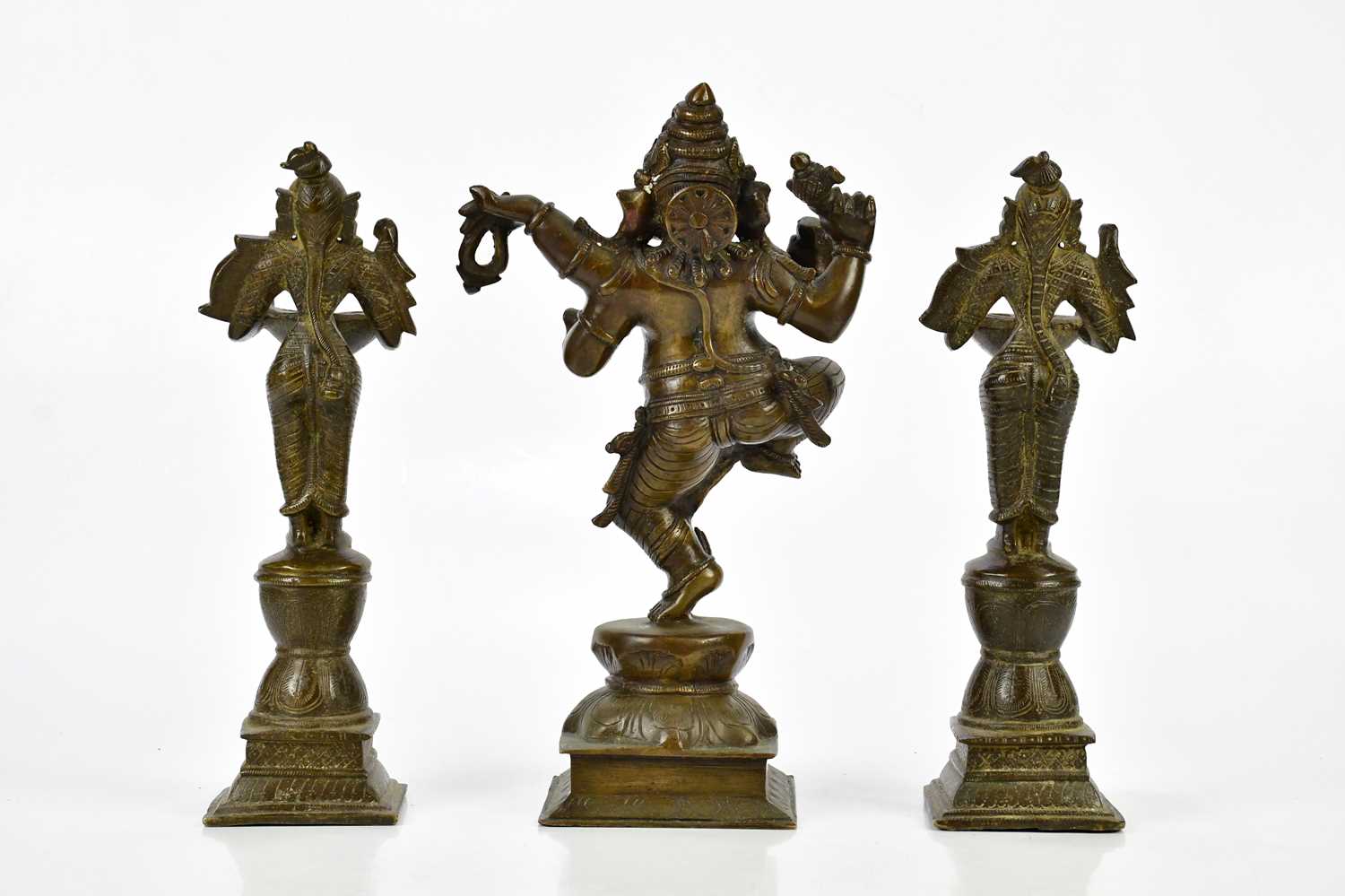 A bronze figure of Ganesh, together with a pair of bronze wick lamps, height of largest 29cm. - Image 7 of 8