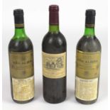 RED WINE; three mixed bottles, including a bottle Chateau Cantemerle Haut-Medoc 1982, 75cl (3)