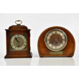 An Elliot type walnut bracket clock, the dial set with Arabic and Roman numerals, height 27cm and an