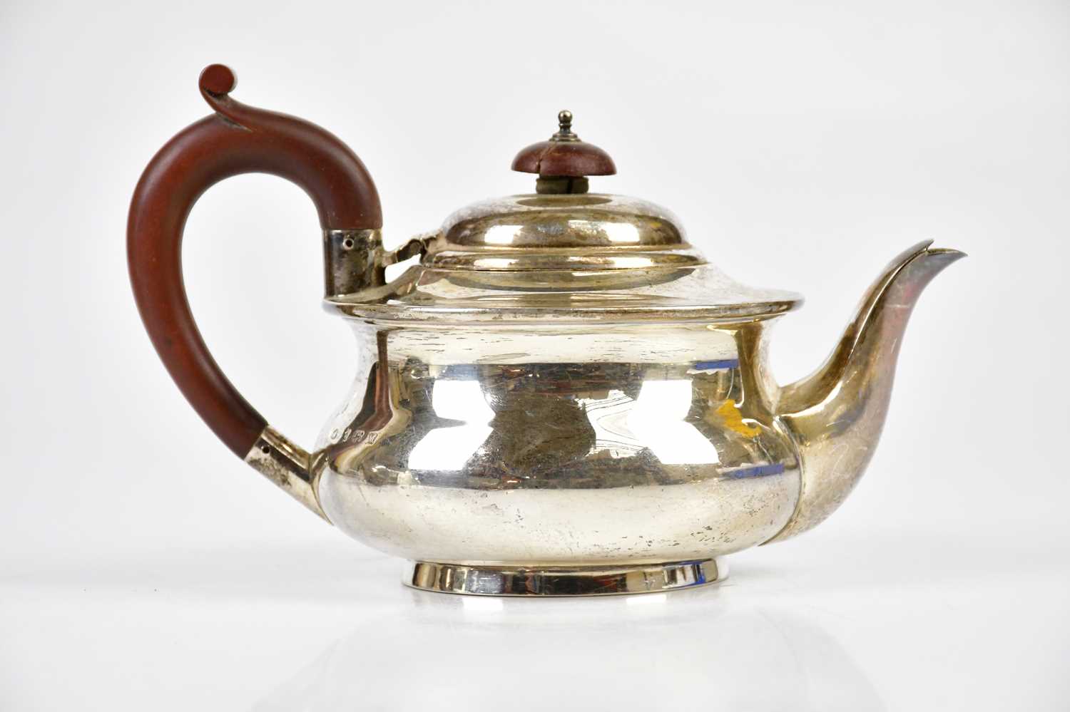 ADIE BROTHERS LTD; a hallmarked silver tea pot, with bakelite finial and handle, Birmingham 1936,