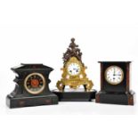 LEROY A PARIS; a French spelter eight day figural mantel clock, on associated base, height 39cm,