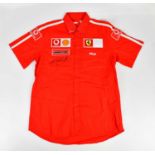 MICHAEL SCHUMACHER; a signed FILA Ferrari shirt, signed to the front, size XL. Condition Report: