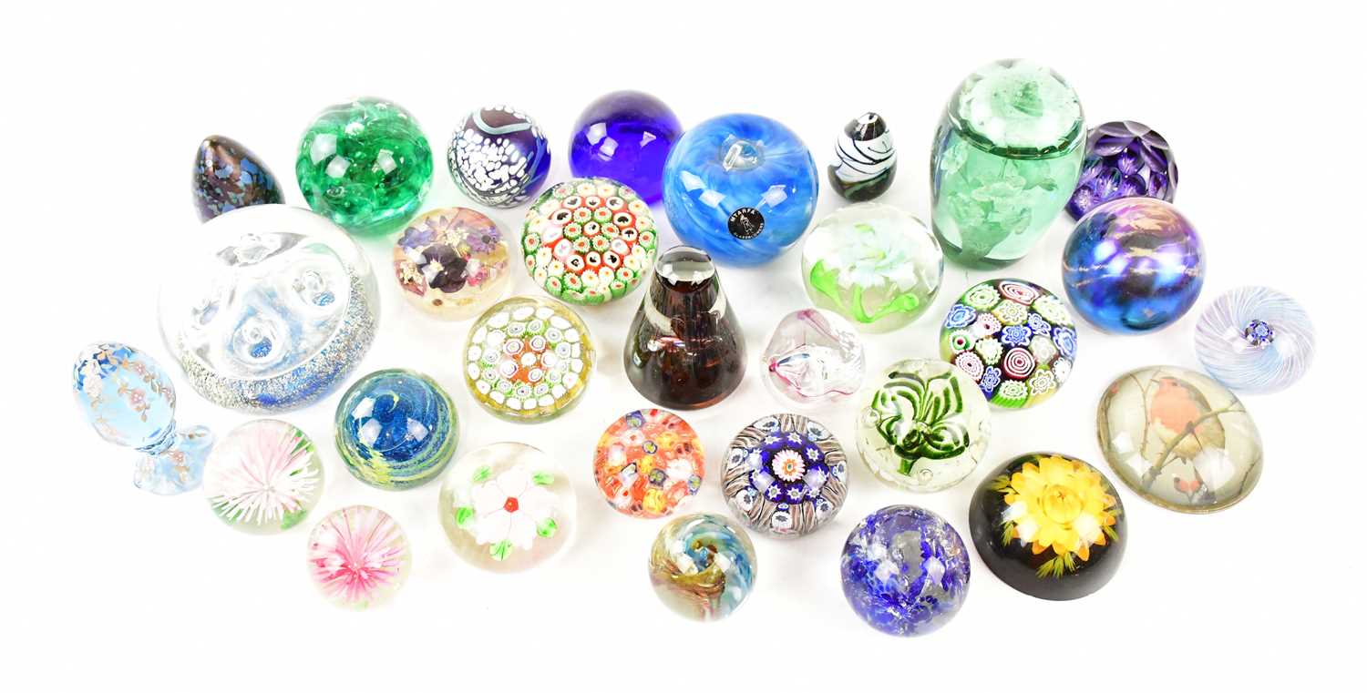 A collection of various glass paperweights including a hand painted A Meeks limited edition