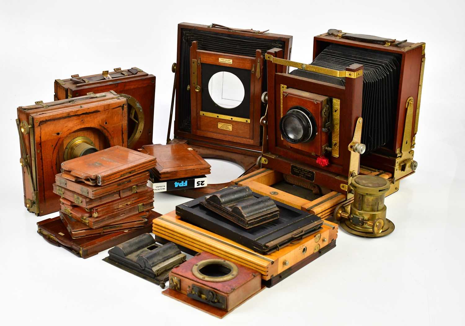 THORNTON-PICKARD; a brass and mahogany plate camera (later editions), with a plate camera section by