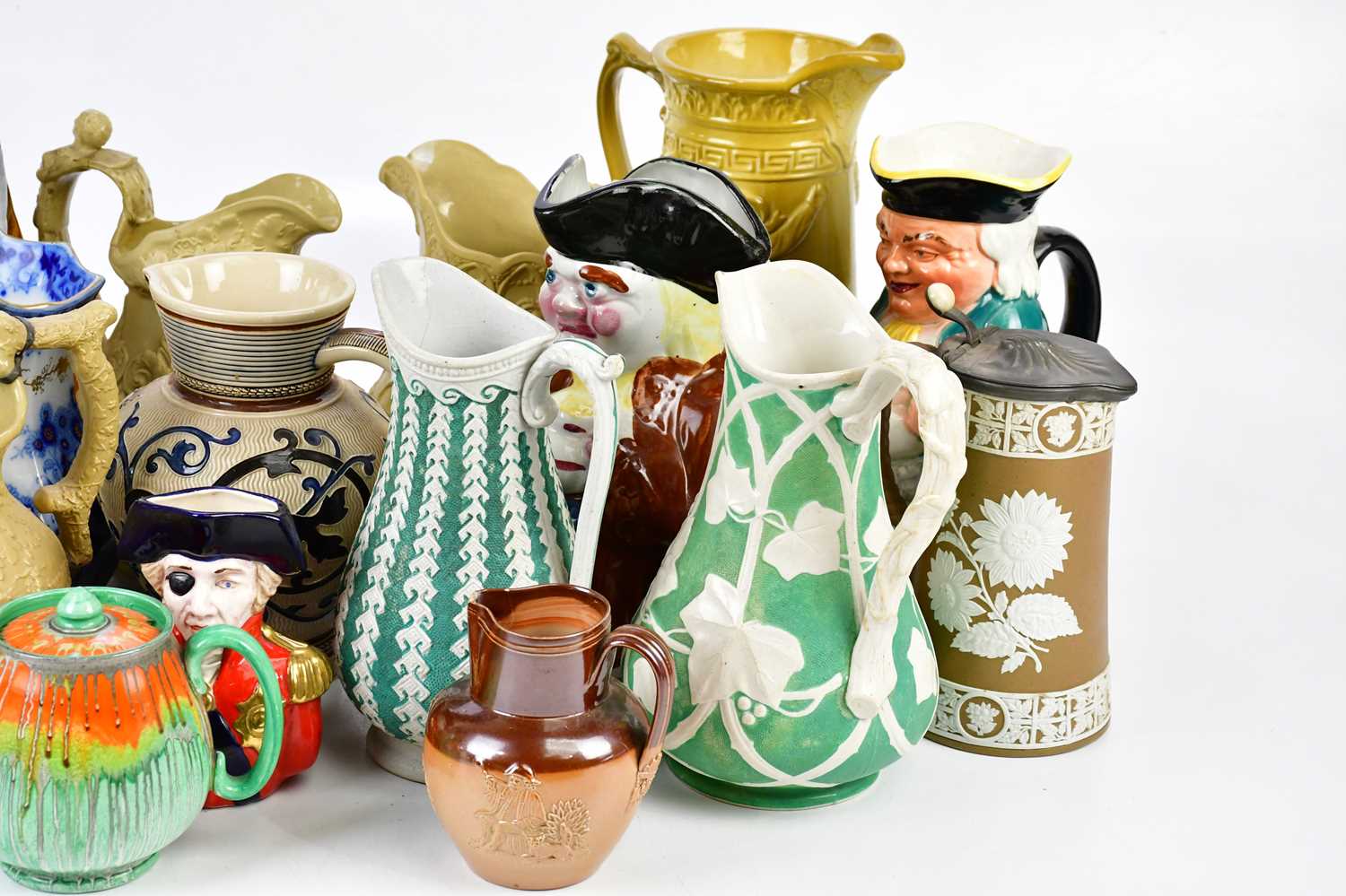A collection of fourteen 19th century and later decorative jugs including two Toby Jugs and a - Image 3 of 4