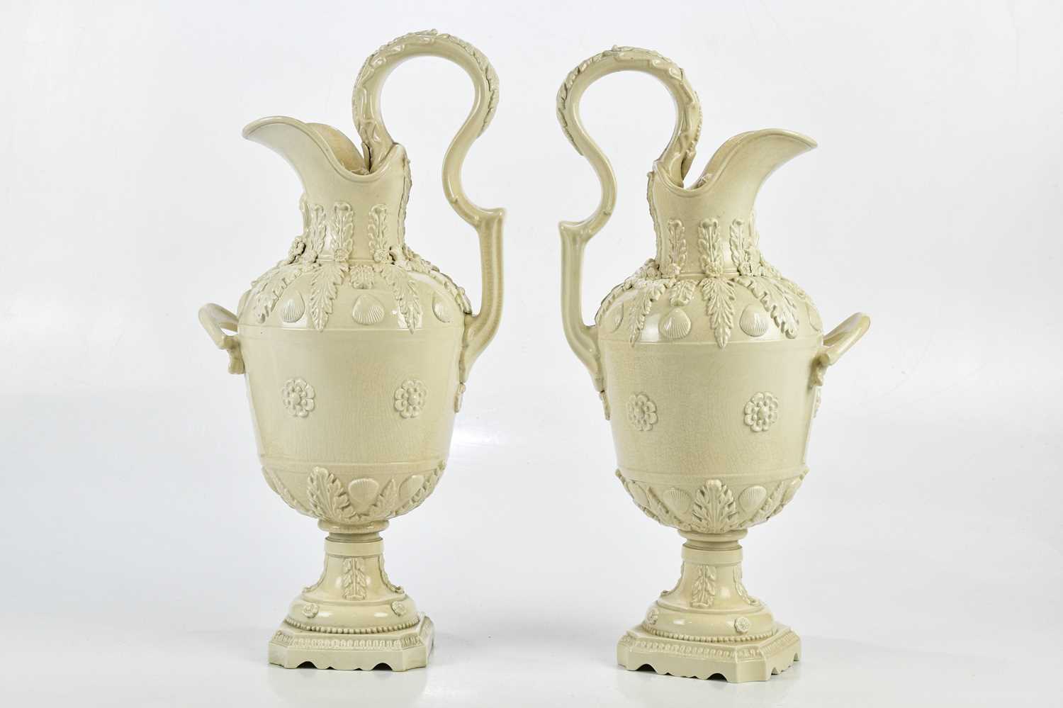 PETER WELDON; a pair of crackle glazed ewers, relief decorated with shells and floral detail, height - Bild 2 aus 6