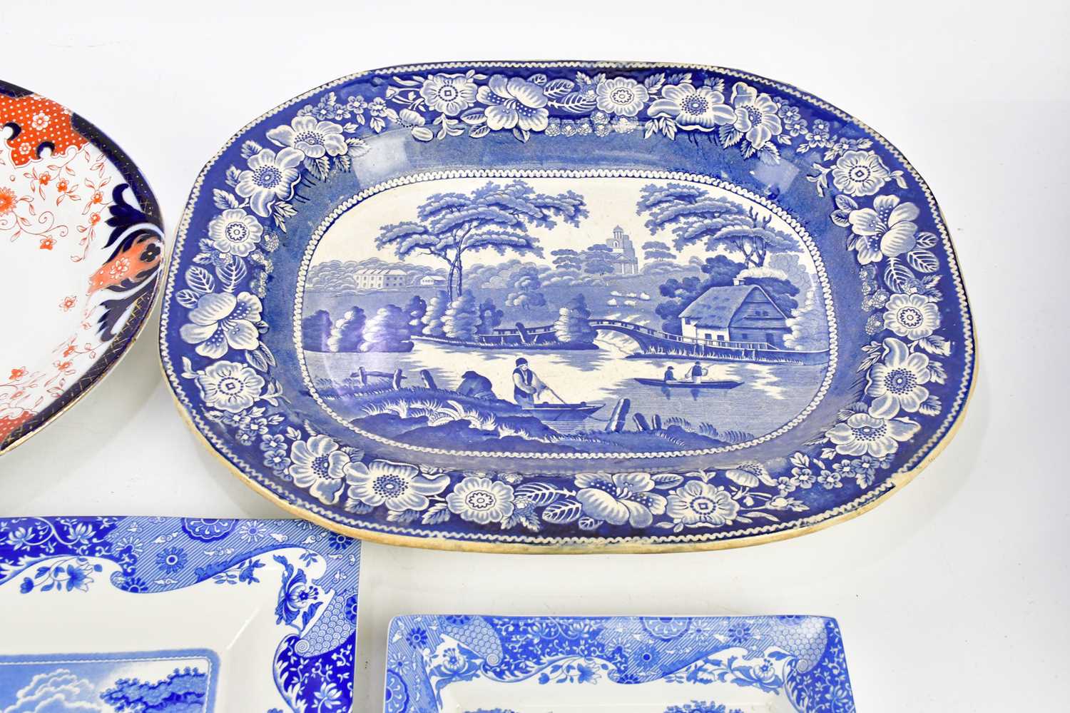 A Victorian blue and white meat plate decorated with a river scene, length 45cm, a further meat - Image 4 of 5