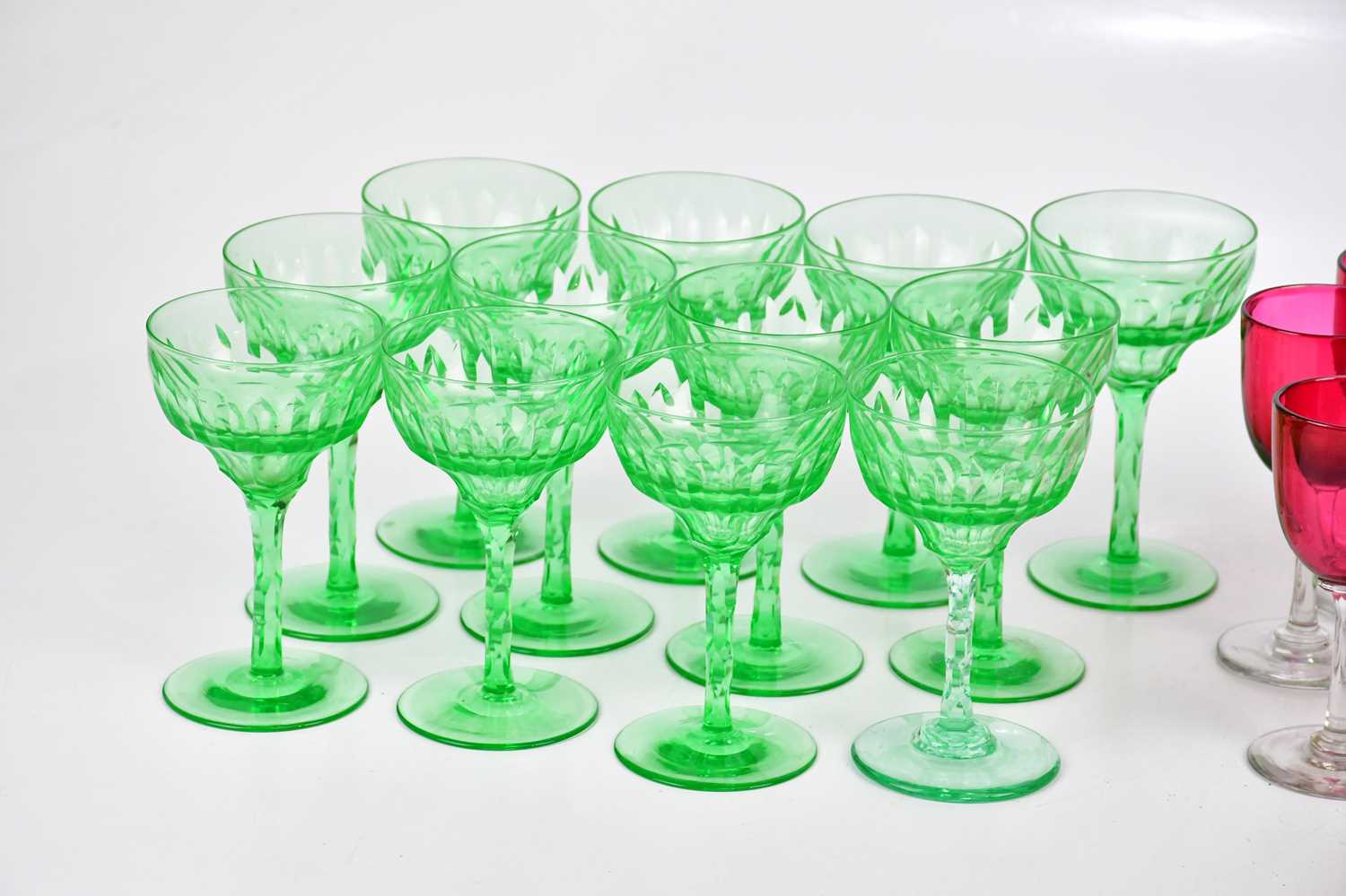 A set of twelve 1930s cut green glass wine glasses, height 12.5cm, with eight late Victorian ruby - Image 2 of 4