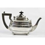 GEORGE NATHAN & RIDLEY HAYES; a George V hallmarked silver teapot of panelled form on bun feet,