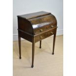 An Edwardian mahogany roll top desk with two drawers on spade feet, width 75cm, height 95cm.