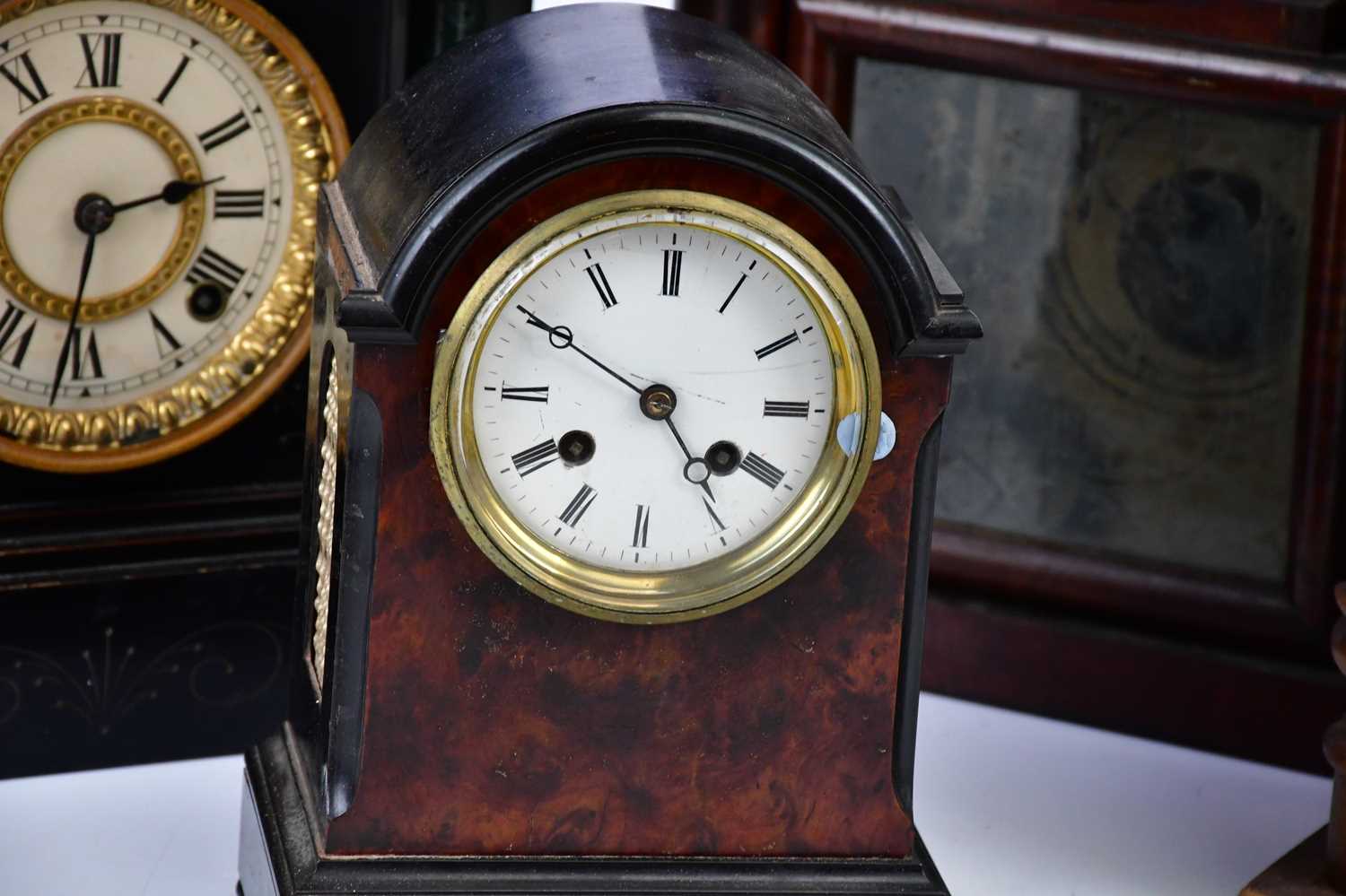 An American lancet shaped wall clock, with glass door and internal printed label, height 46cm, and - Image 3 of 4