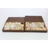 Two cases of gemological samples including peridot, quartz, aquamarine, tiger's eye, etc.