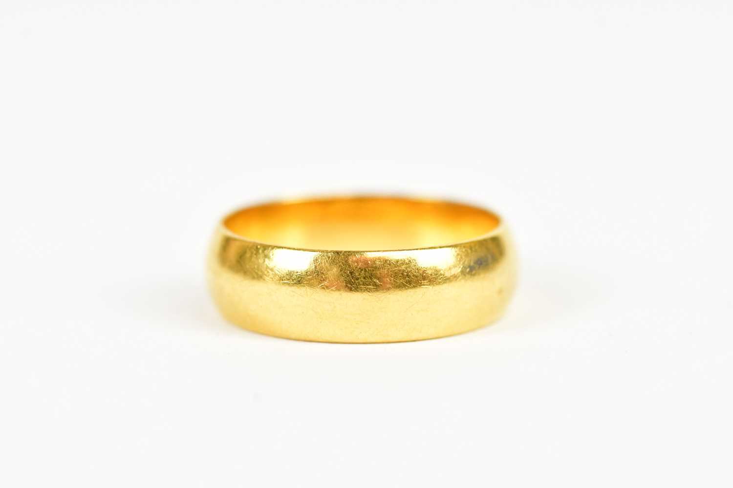 A 22ct yellow gold wedding band, size K, weight 5g. - Image 2 of 3