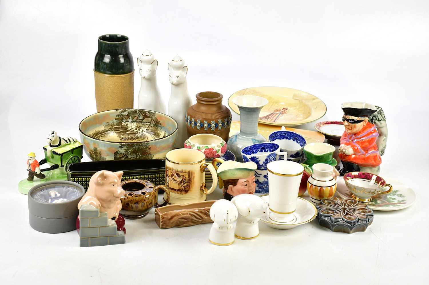 A collection of assorted ceramics including a Doulton Silicon ware vase, a Beswick character jug,