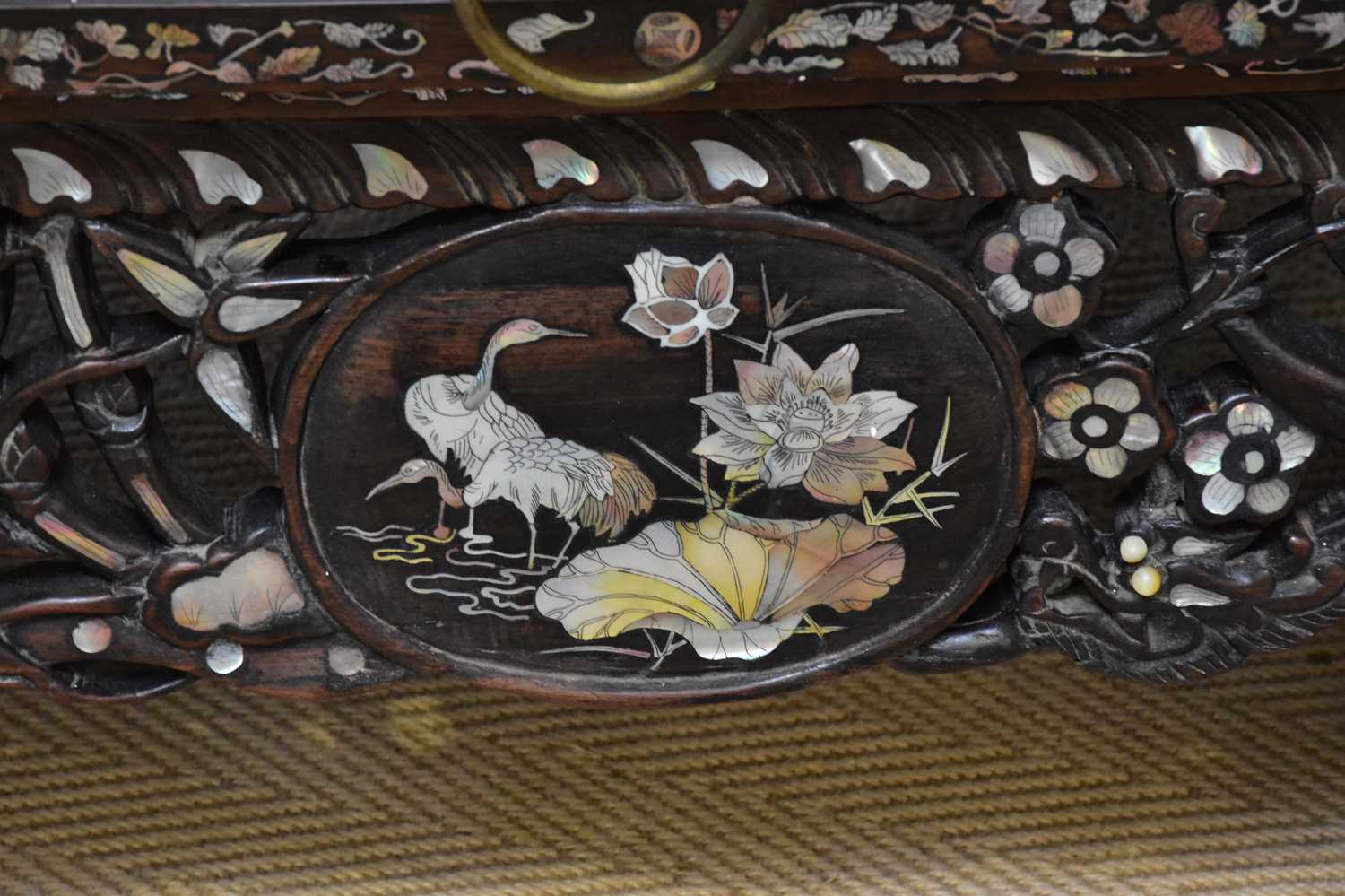 A Chinese ebonised carved display cabinet with mother of pearl inlaid decoration depicting - Image 7 of 13