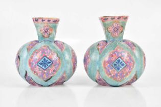 A pair of late Victorian painted opaque glass vases of bulbous form, height 20cm (2). Condition